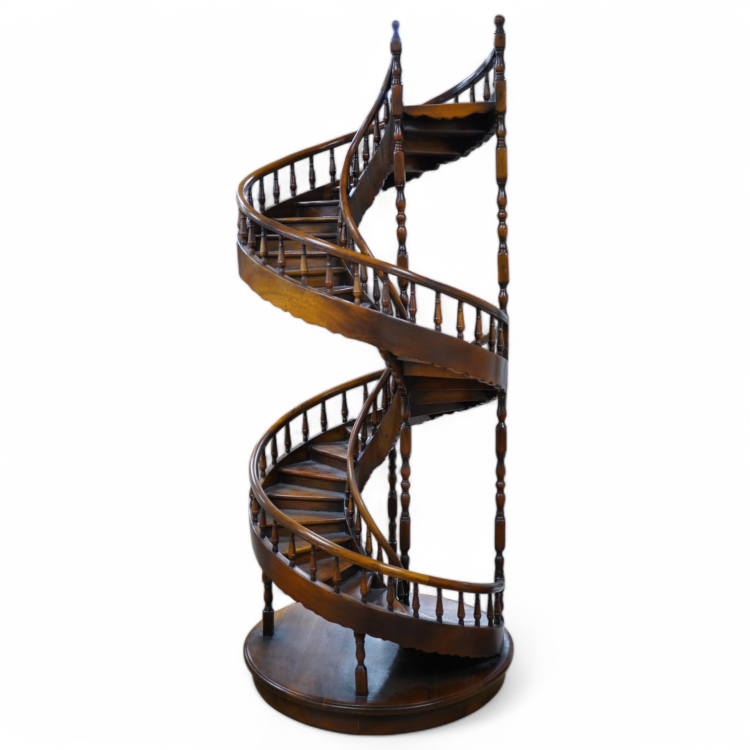 A scale model hardwood spiral staircase, 106cm tall. Condition - good